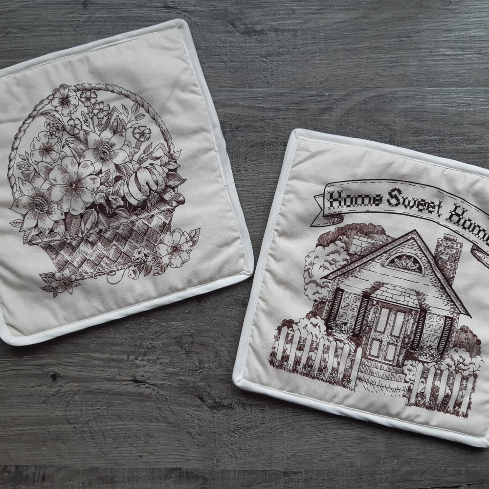 Set of 2 Cream Printed Quilted Pot Holders - Home Sweet Home & Floral Basket
